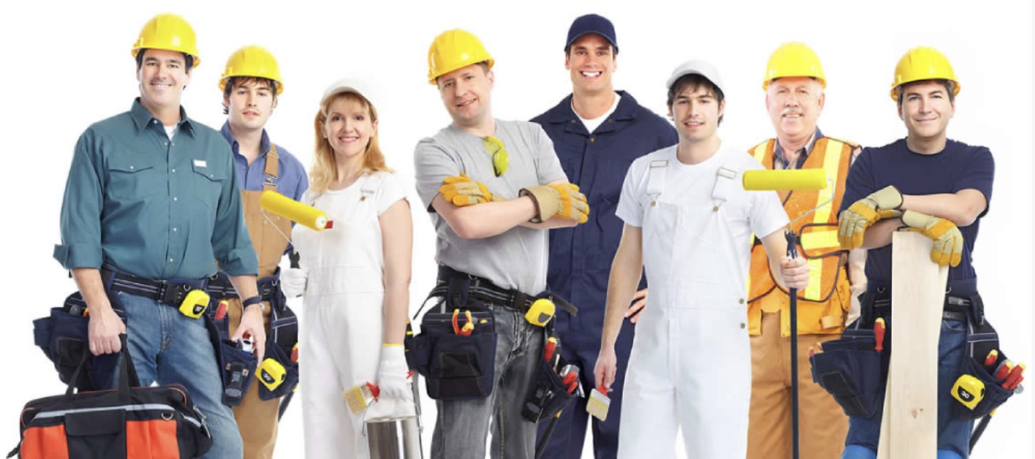 A group of tradespeople in work gear